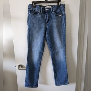 Levi's 312 Shaping Slim medium wash jeans